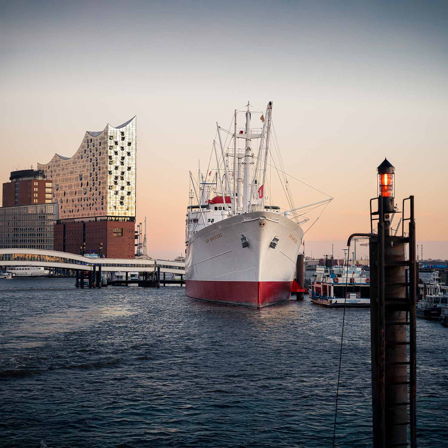 Guide leading a small group through HafenCity, Hamburg